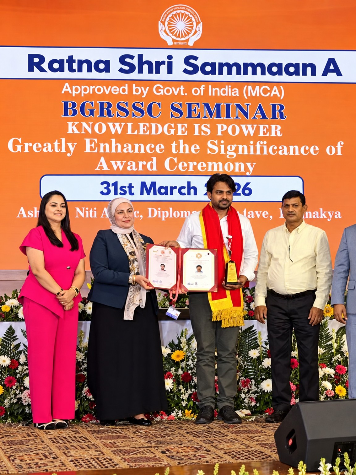 Dr. Amit Mehra receiving an award on stage