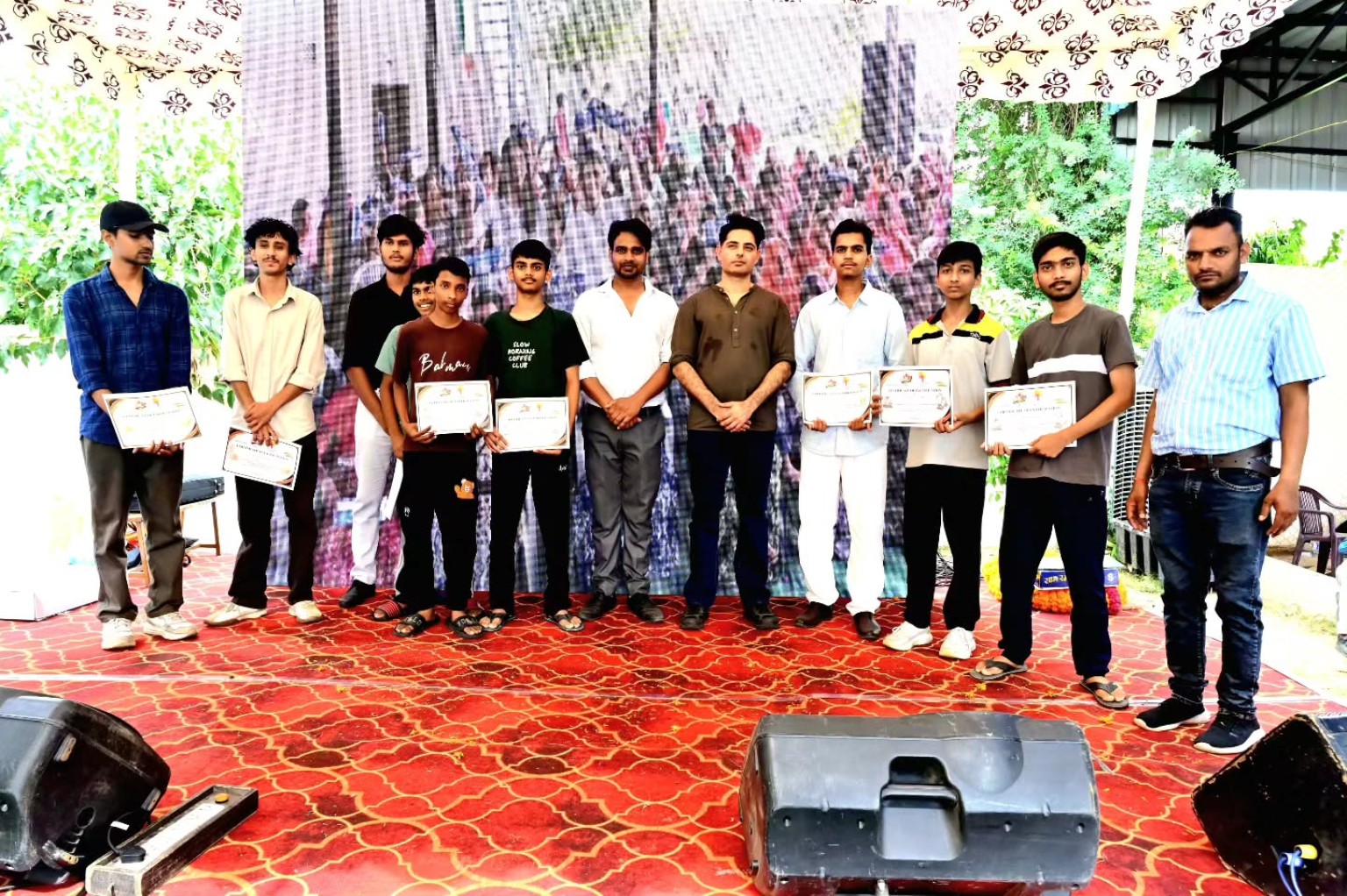 Students celebrating their participation with certificates